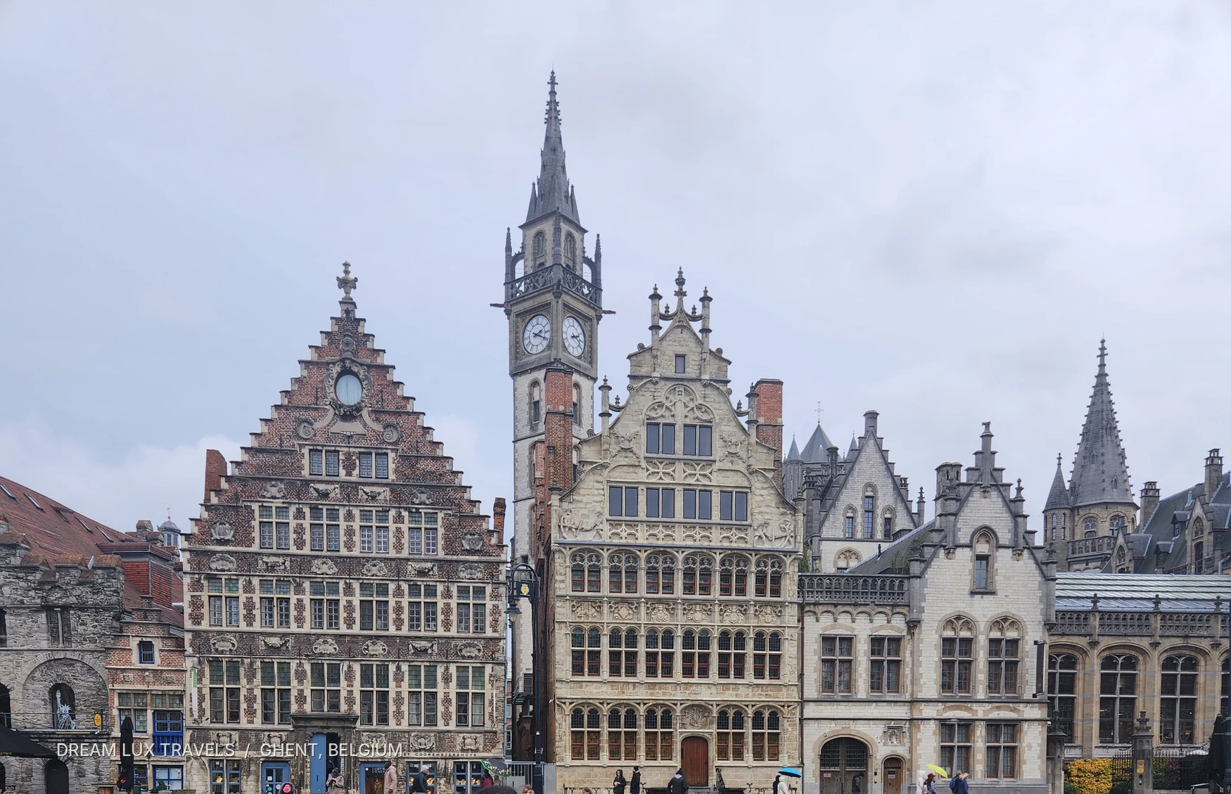 Historic ornate buildings in Ghent photographed during the day.