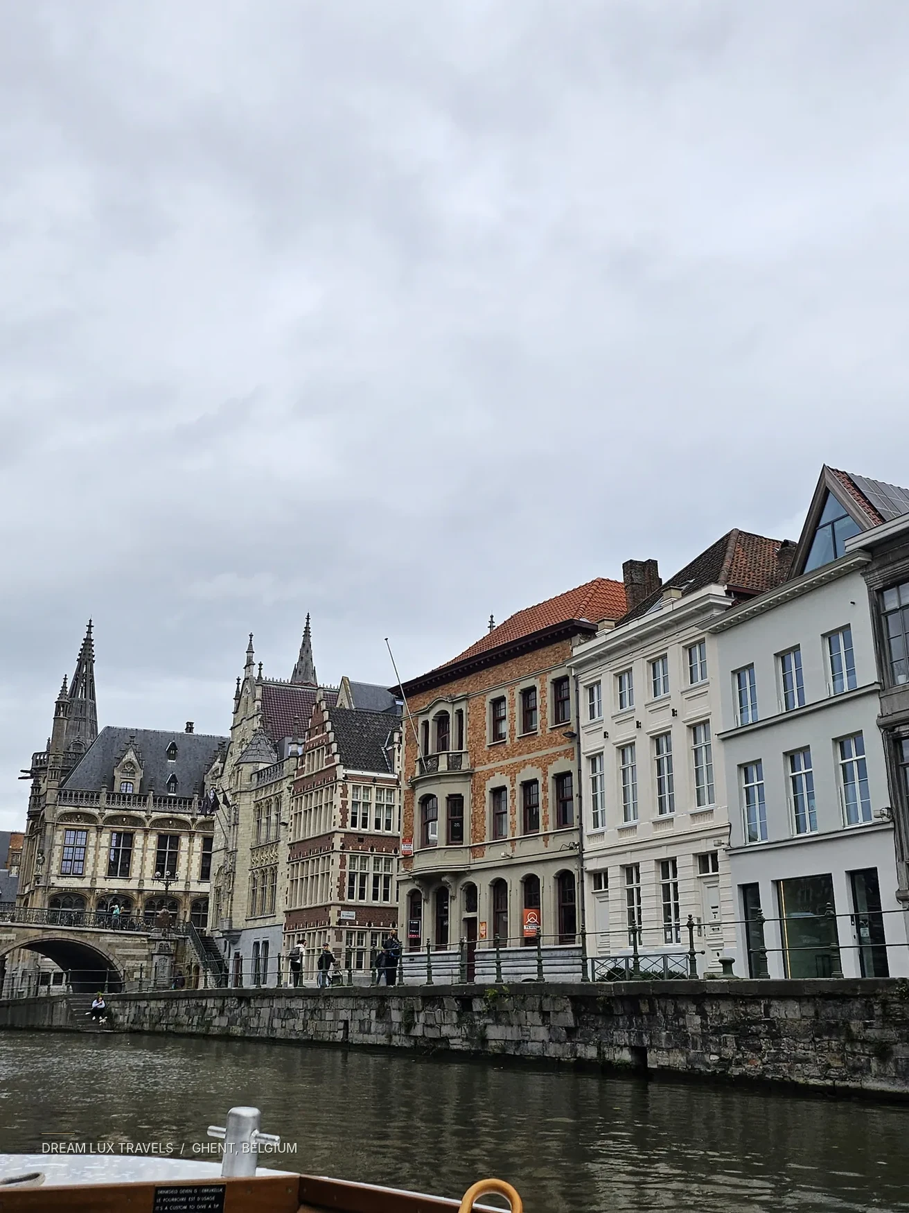Ghent canal lined with historic Belgian architecture, photographed on our trip